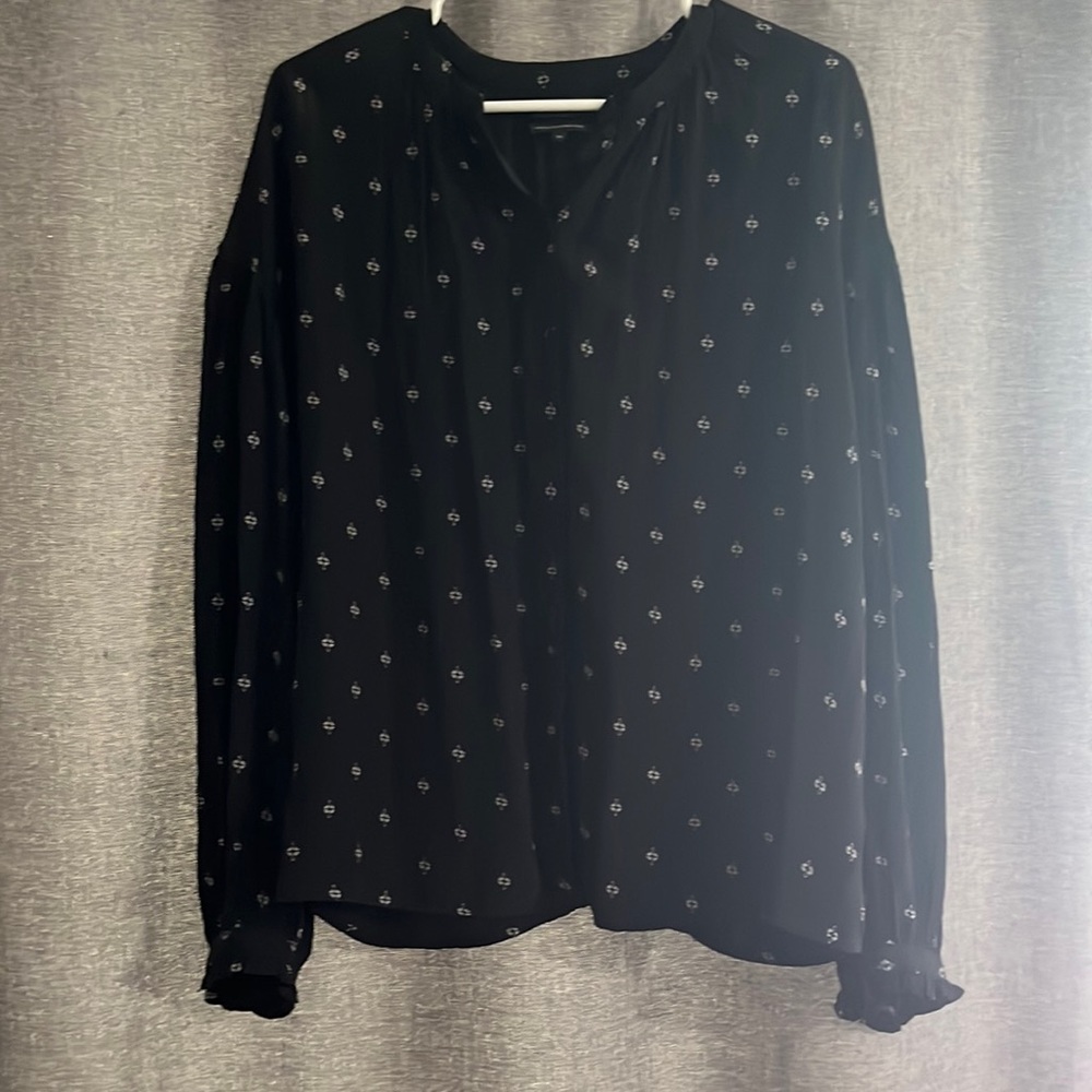 Black button up blouse with flower pattern